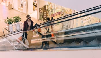 a person on an escalator