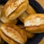 a bowl of bread on a table