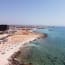 a beach with a body of water