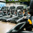 a group of treadmills in a gym