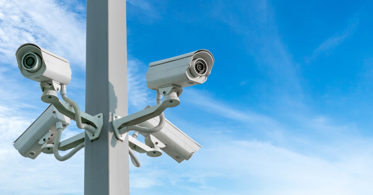 image of surveillance cameras on a pole