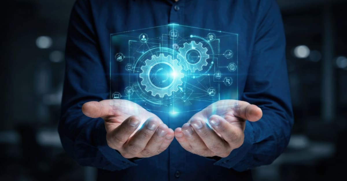 image of a person holding digital gears in the palm of his hands image of a person holding digital gears in the palm of his hands