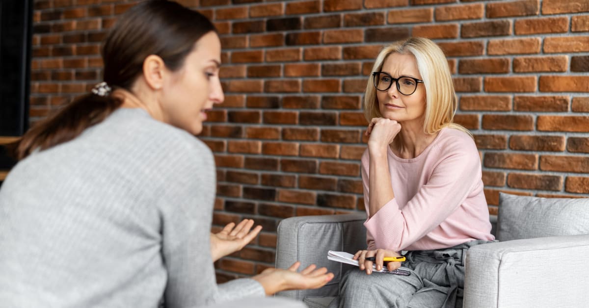 image of a woman in front of a female therapist
