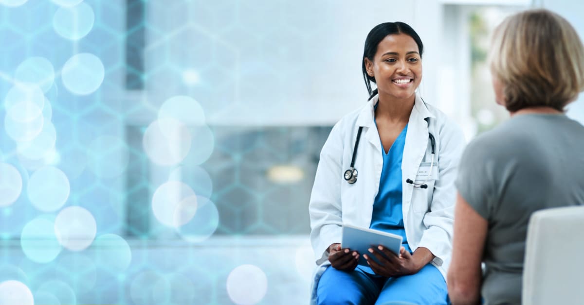 image of a doctor and patient having a consultation image of a doctor and patient having a consultation
