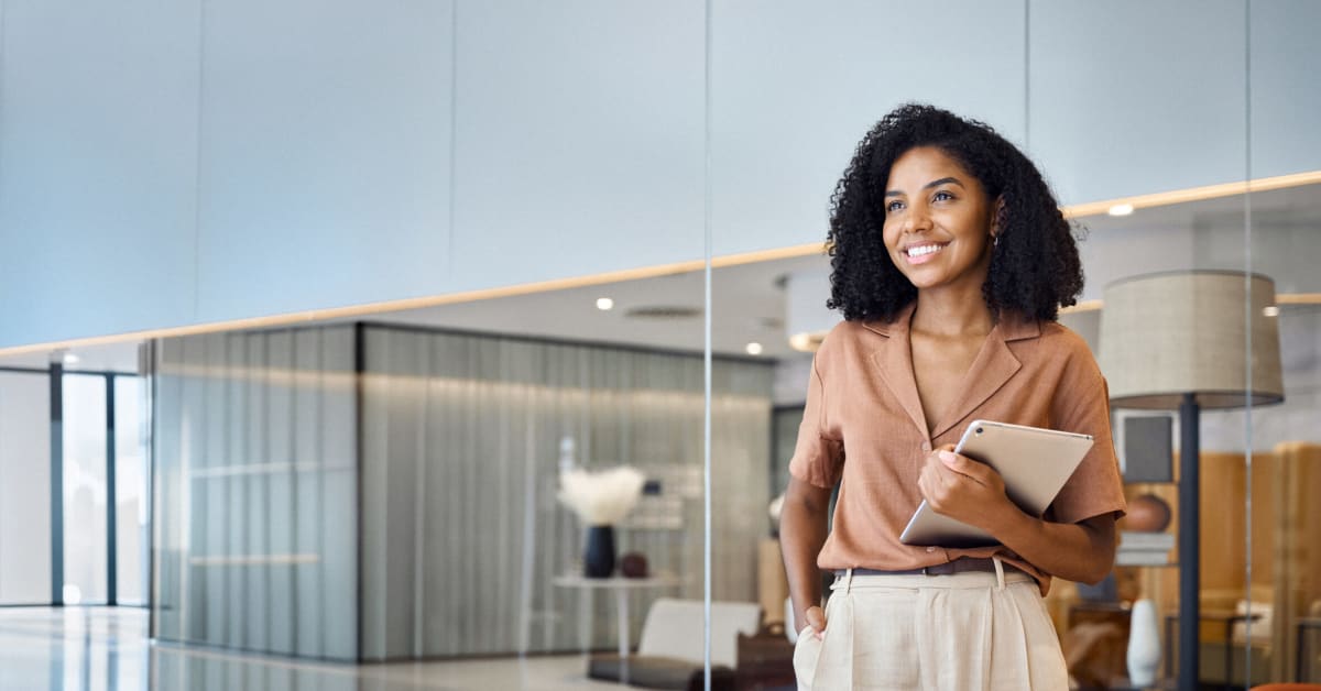 image of young business woman at office with tablet