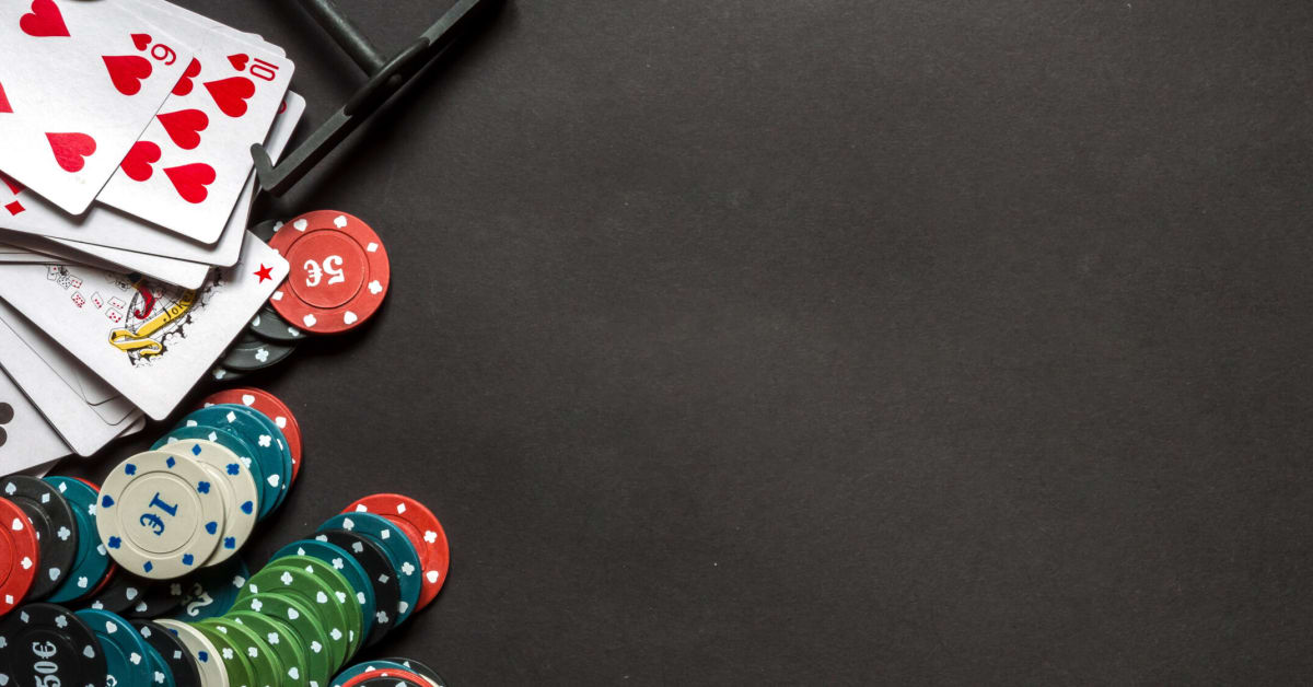 poker chips and cards on casino table