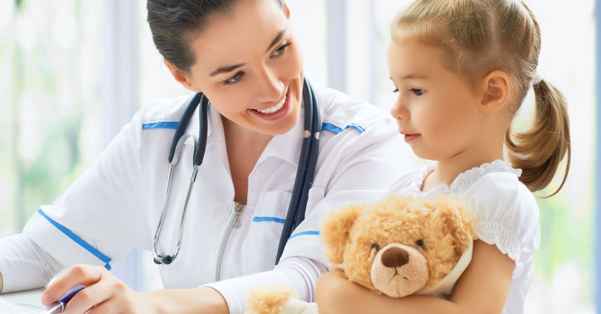 nurse with a little girl
