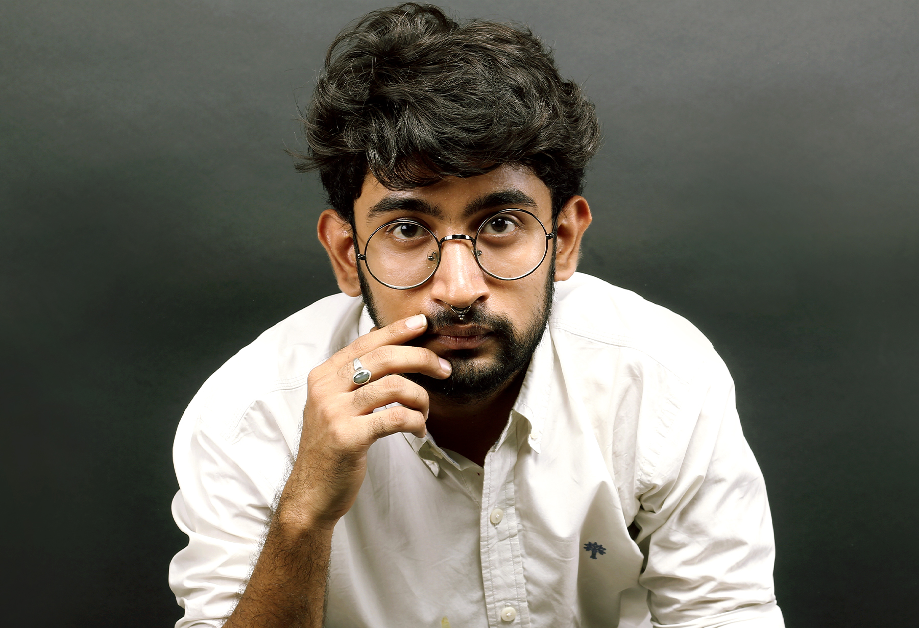 Serious man with glasses