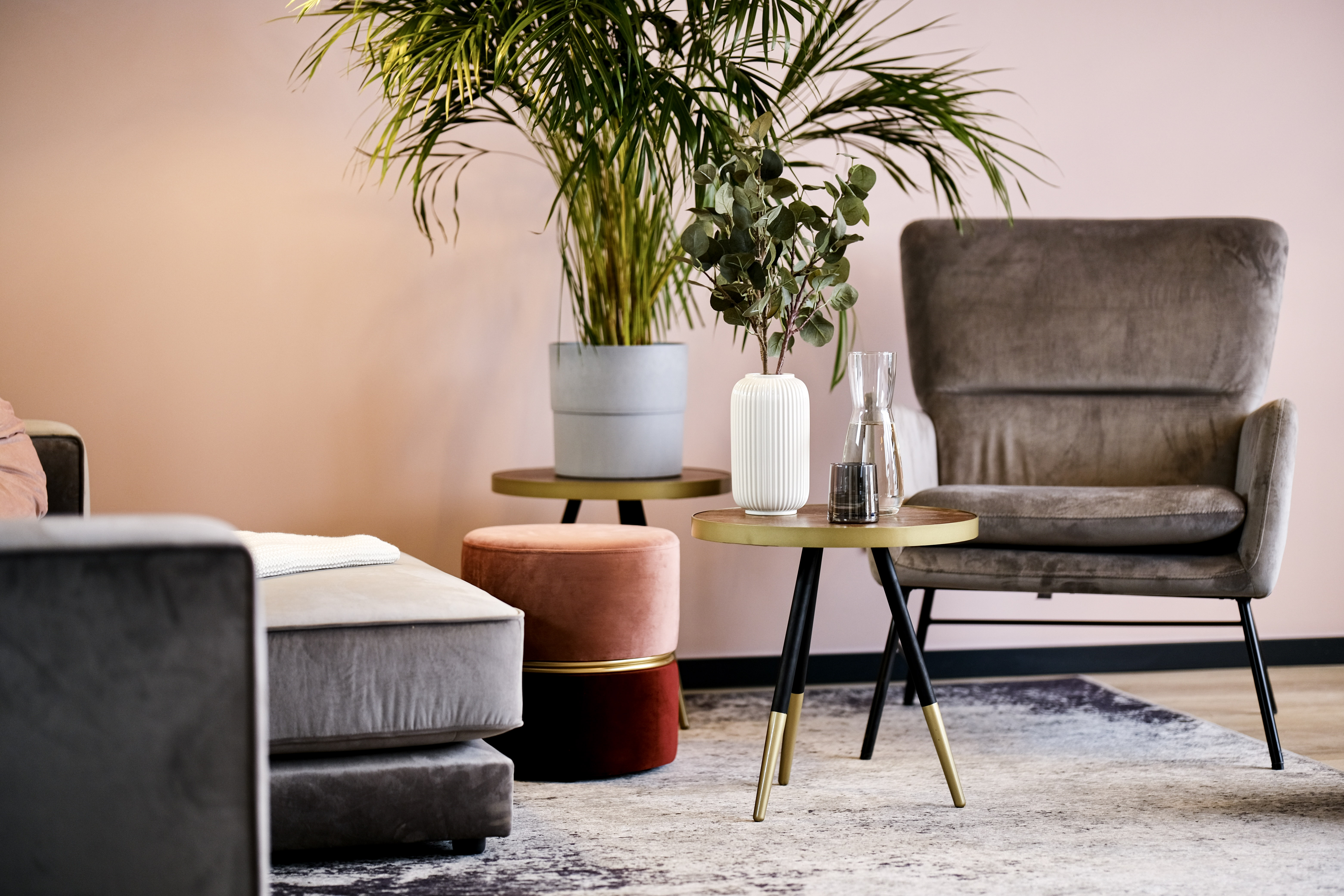 Modern interior in the coliving space with a comfortable armchair