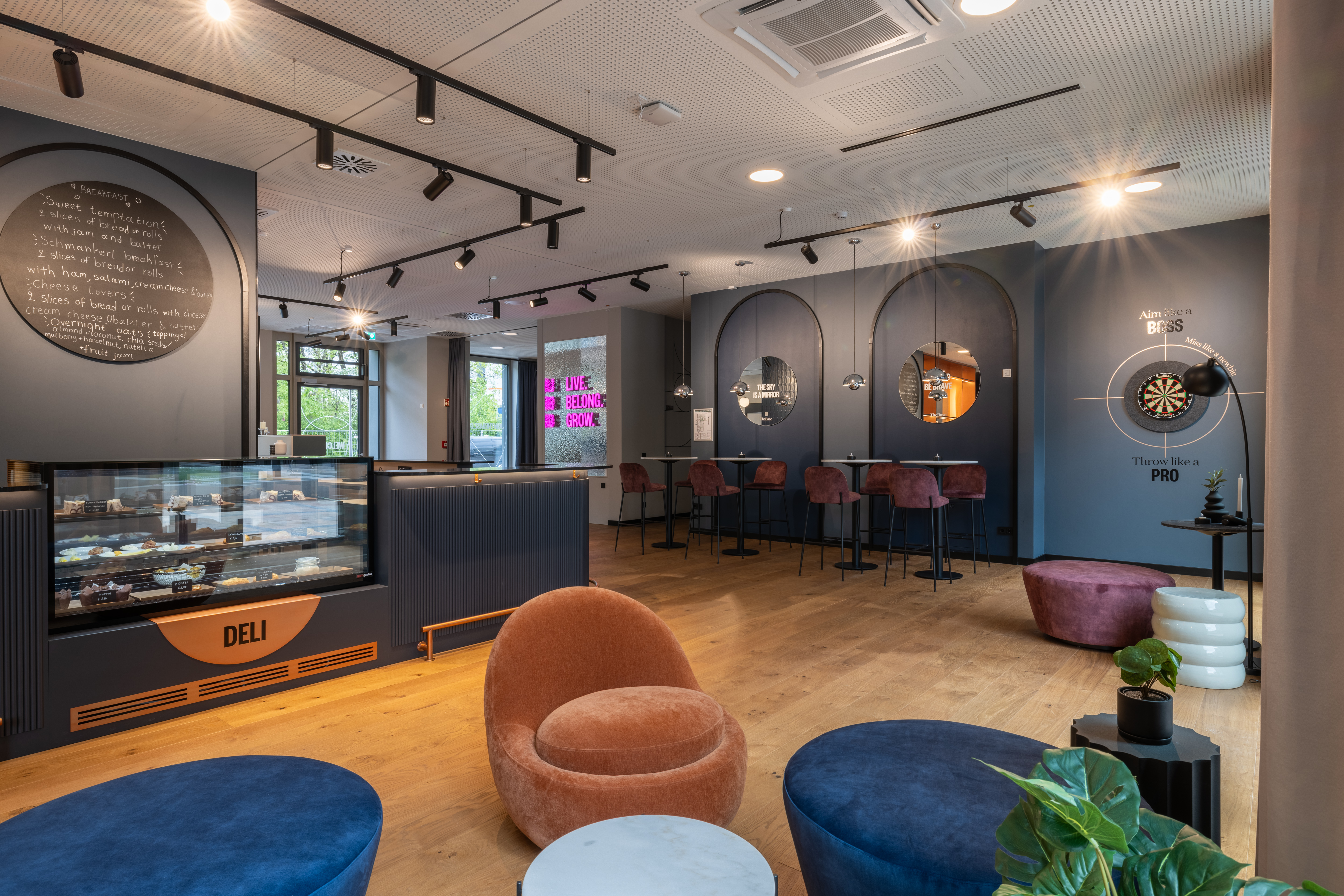 Lounge area in the coliving space at The Base Munich