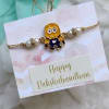 Rakhi - Enamel Cartoon - Yellow And Blue - Single Piece Online