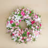 Small premium funeral wreath in shades of pink Online