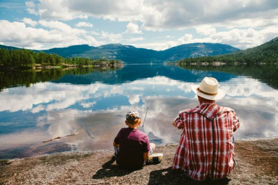 Father and son lake fishing