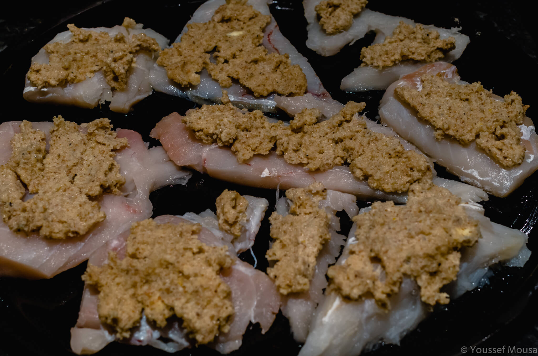 Crumb mixture on the cod before cooking