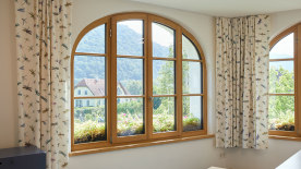 Holz/Alu Rundbogenfenster von Josko