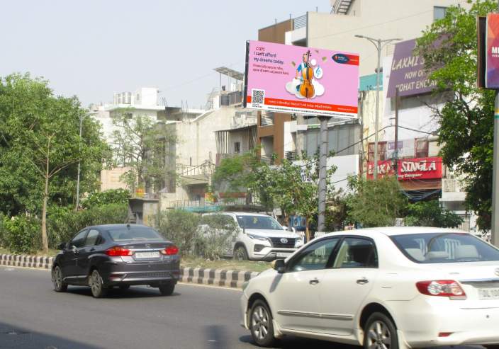 Unipole at Saraswati Vihar Nr Arrow Store, Peeragarhi towards Madhuban Chowk, New Delhi photo 1