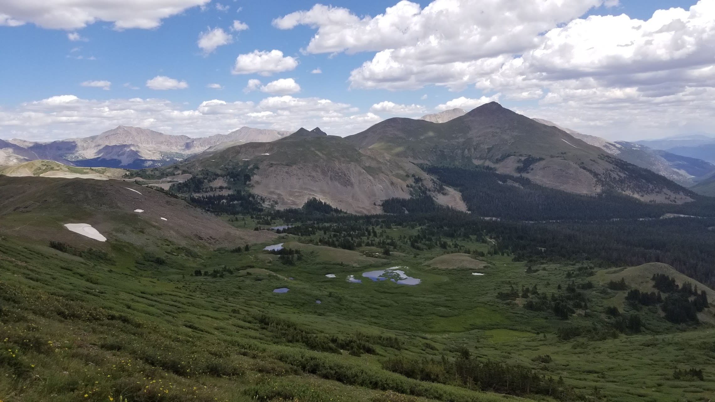 Mountains surrounding alpine lake