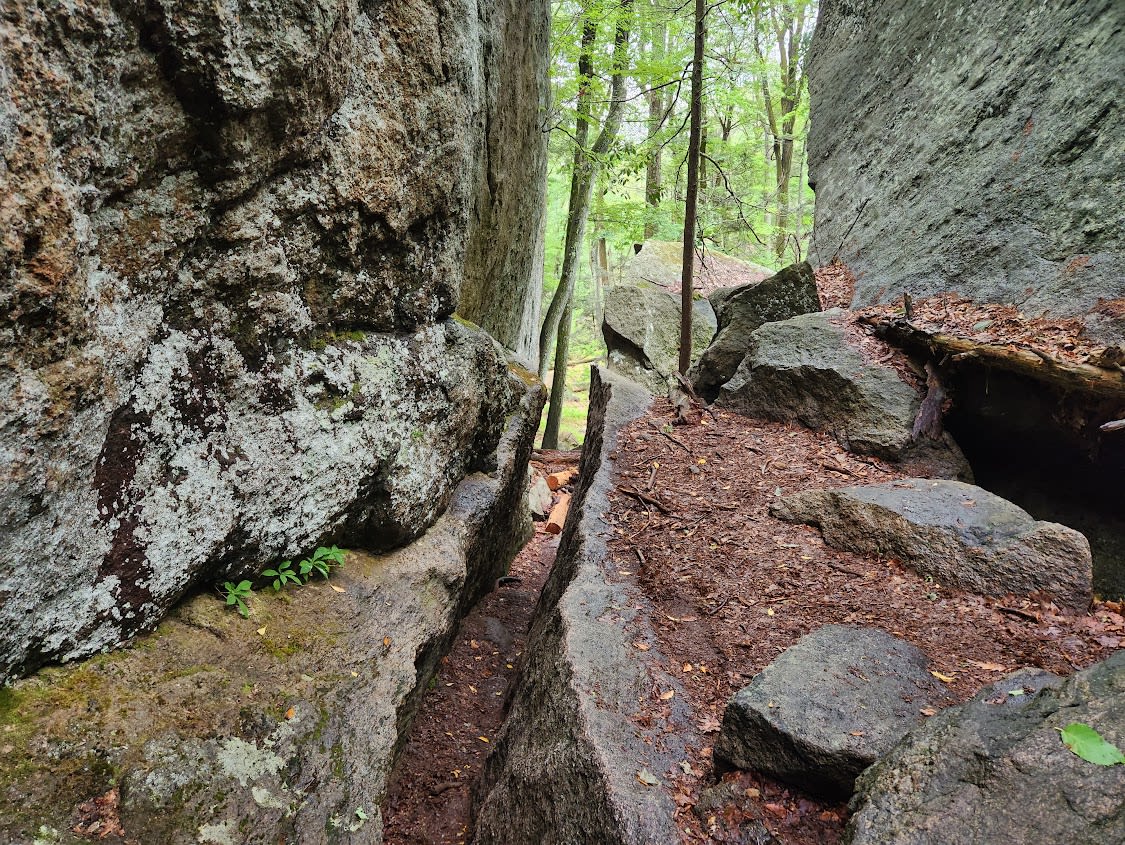 Appalachian Trail through a narrow rock crevice in New York