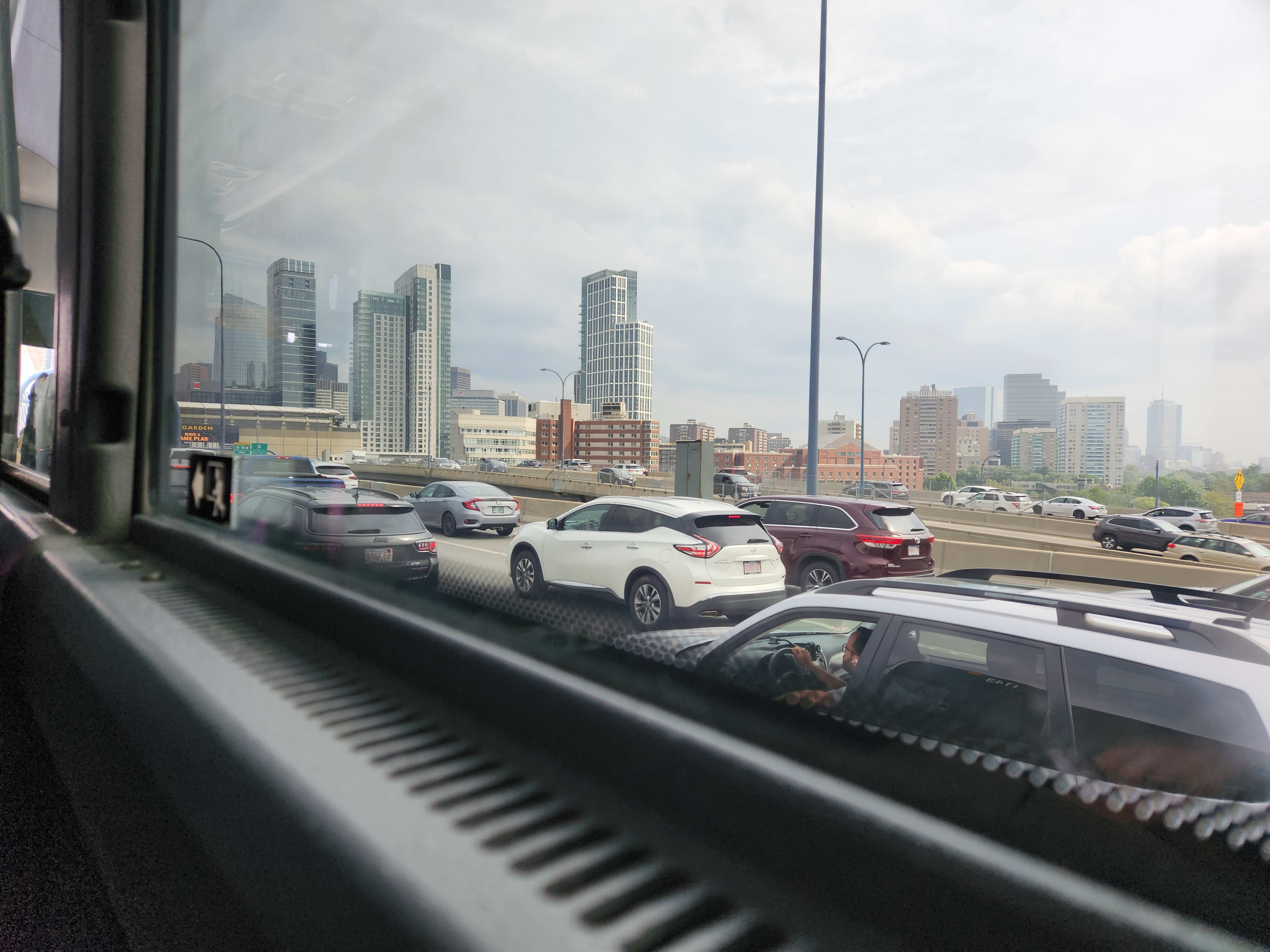 Boston City and traffic from bus window
