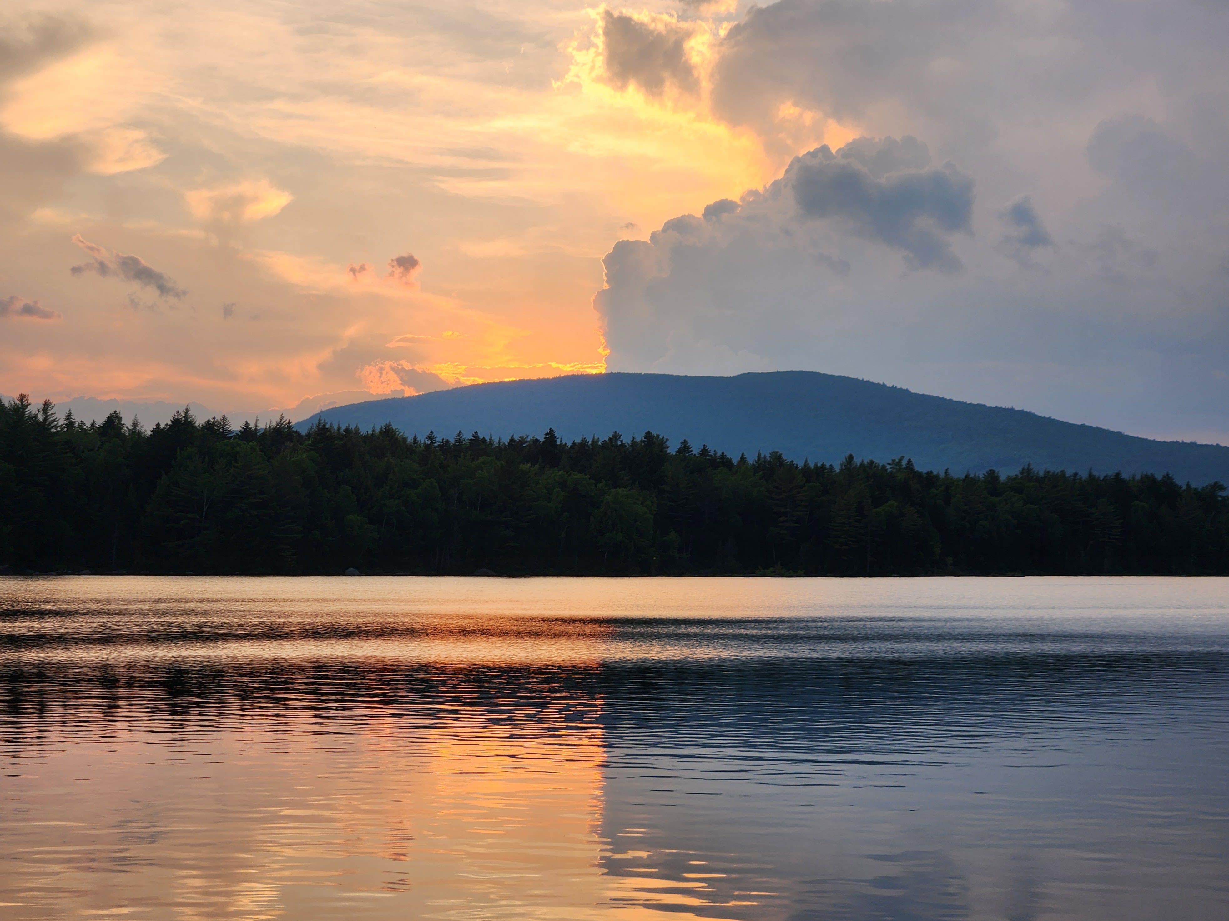 Pink and orange sunset on a lake