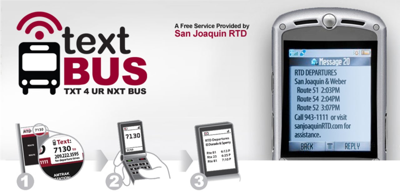 Text Bus stop code signage at a bus stop