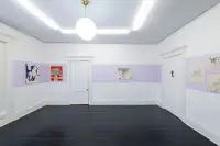 gallery installation of seven artworks and a closed door