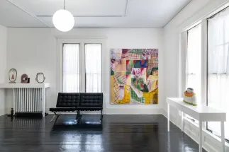 gallery installation of three sculptures a painting and another sculpture