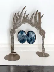 steel sculpture that looks like a face