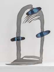 steel sculpture that looks like a face