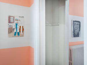 gallery installation of two artworks in two separate rooms