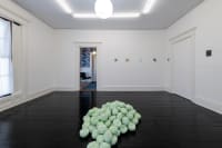 gallery installation of two large oil paintings