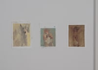 gallery installation of two oil paintings