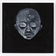 drawing of a face on a black wood board