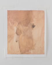 tan abstract painting resembling a human figure