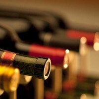 Close up of wine bottles on a wine rack