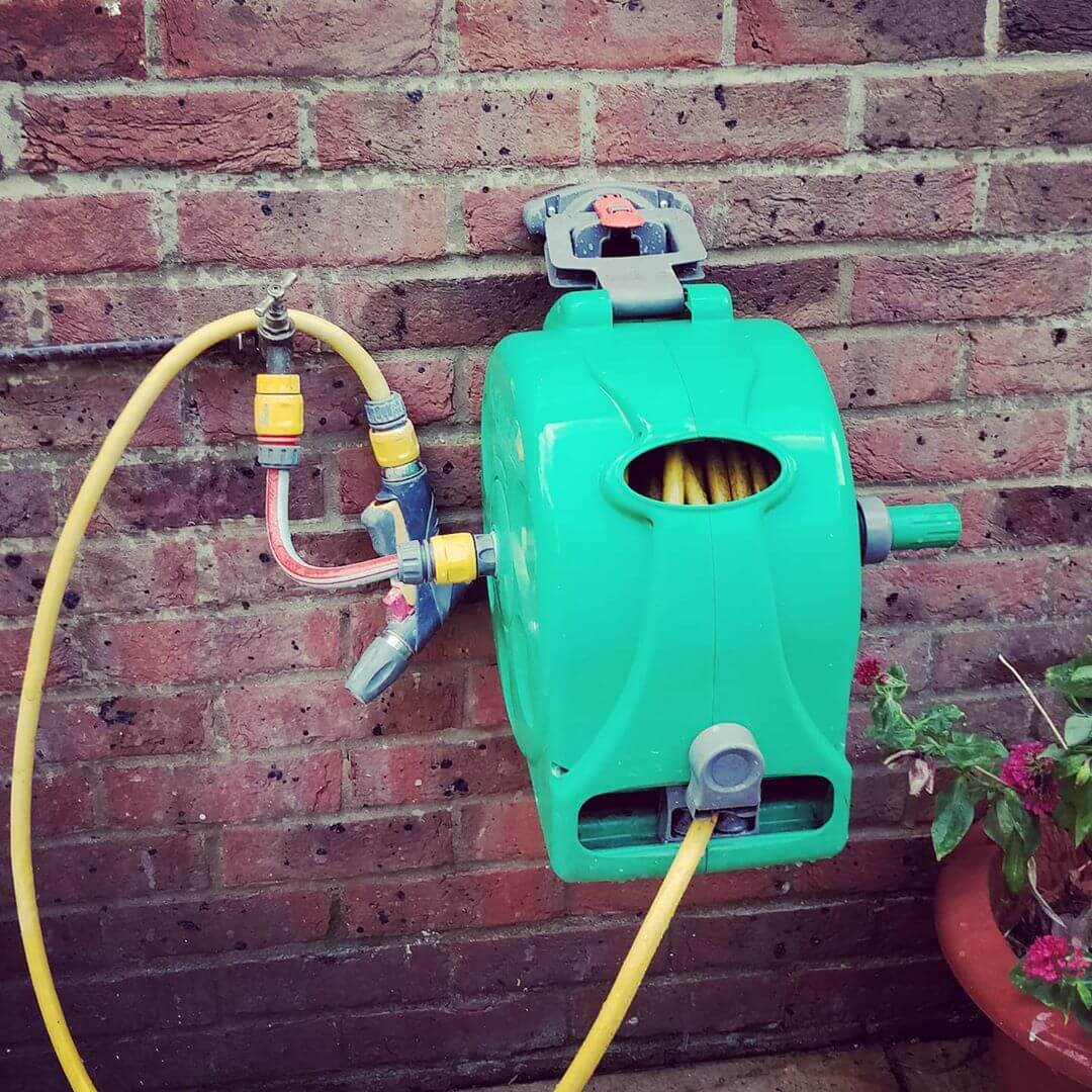 Hose mounted on wall