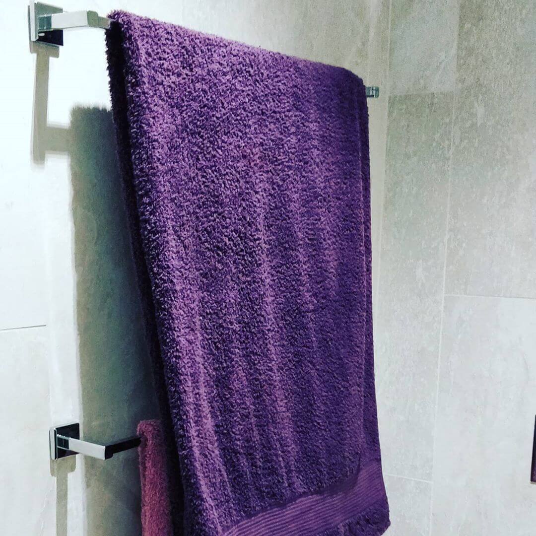 Two towel rails with towels