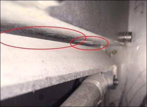The bottom of the arm highlighting sections items may get stuck in.