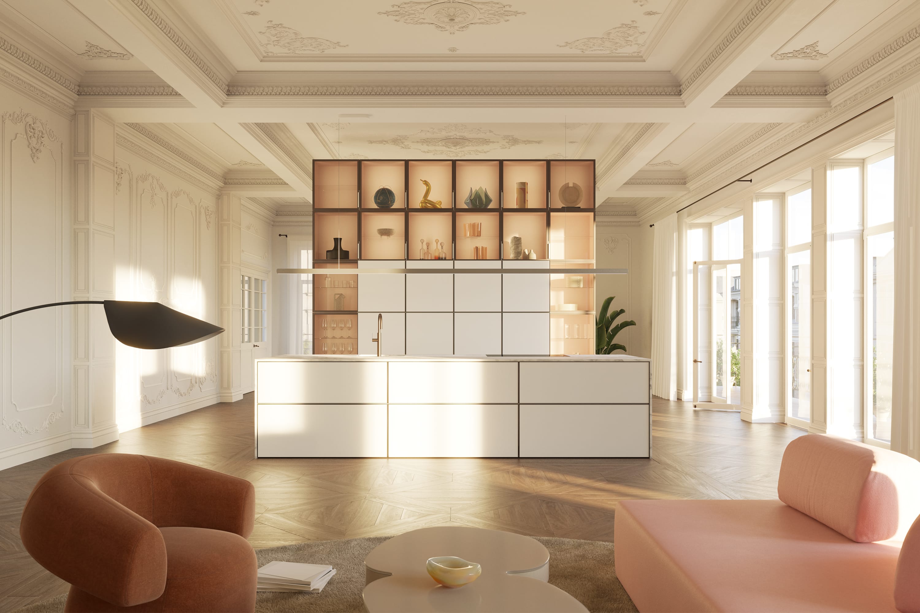 Campaign photography of a white kitchen. In the foreground is a living room table with a sofa and an armchair.