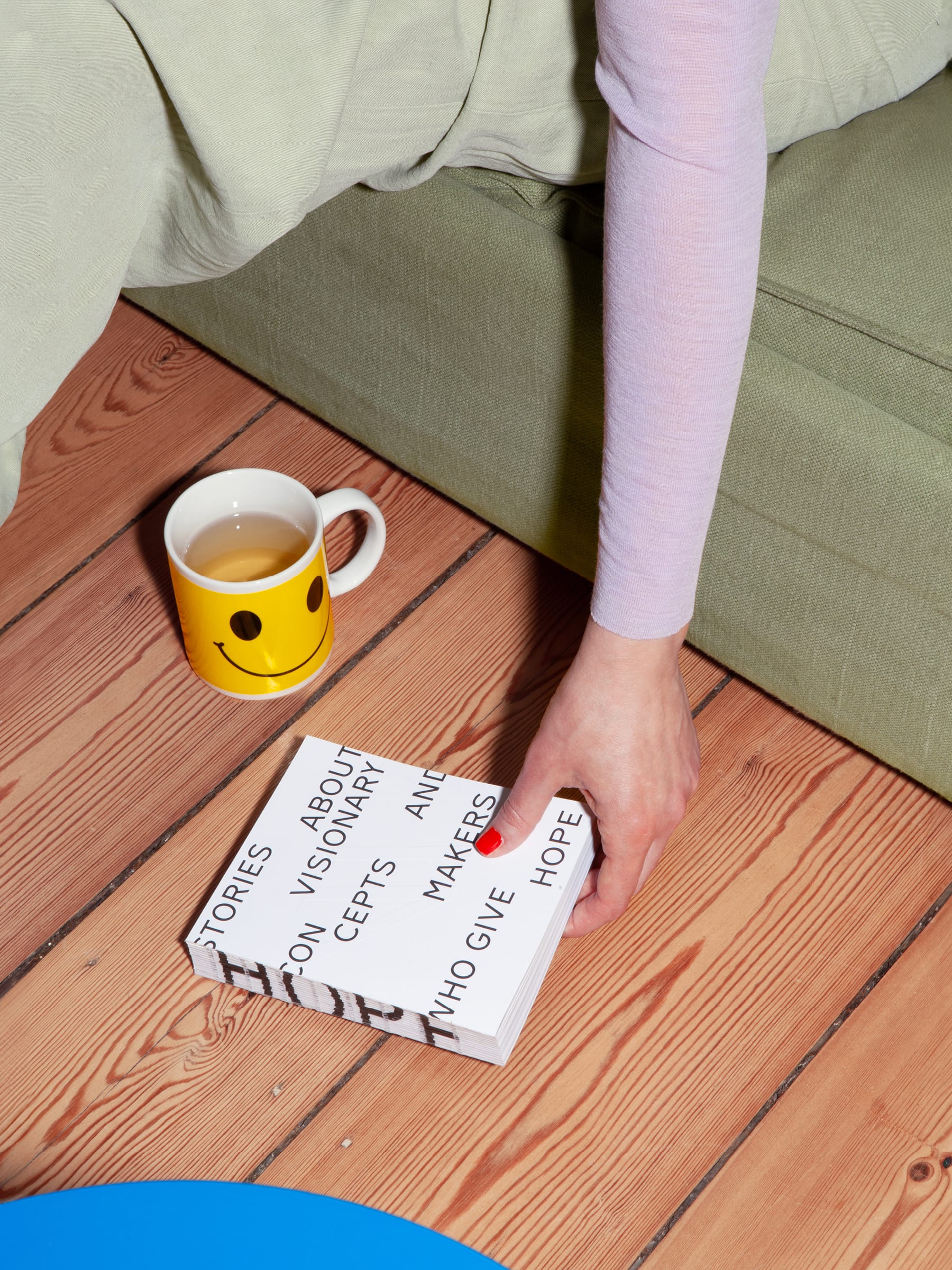 mockup of a person holding the book hope