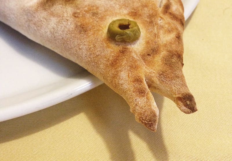 Bread resembling a fish on a plate