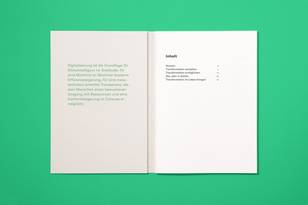 Inside cover with first page with table of contents on green background.