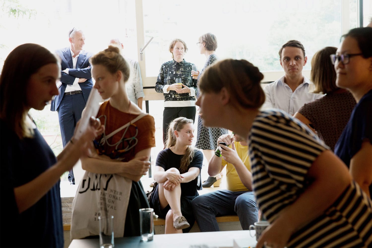 Several people talking in a room