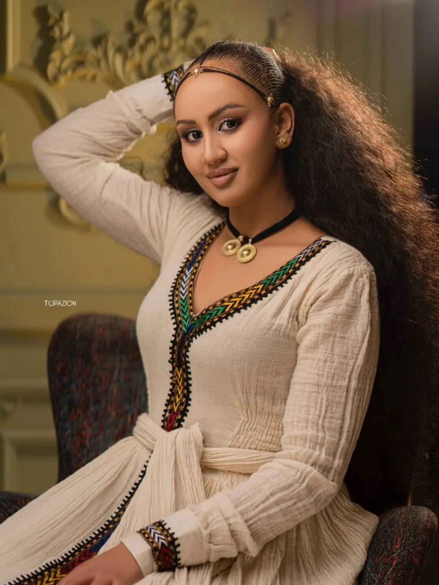 Cream Habesha dress with colorful embroidery | ባለቀለም ጥልፍ ያለው የሀበሻ ቀሚስ (image 2)