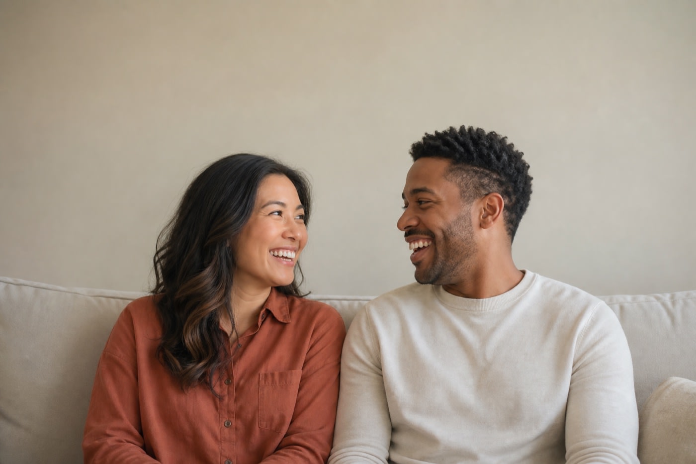 Partners reconnecting with warmth and laughter after couples counseling in Los Angeles