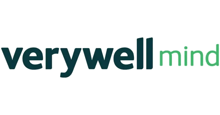 The image shows the "verywell mind" logo with "verywell" in dark green and "mind" in light green on a white background, evoking the calm often found at wellness retreats near me.