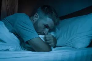 aman in bed feeling emotional deprivation needing psychotherapy in sf ca