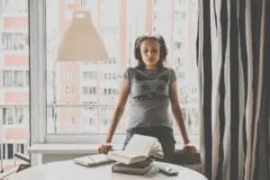 a woman listening to mindfulness audio an embracing effective procrastination with cbt counseling in sf 