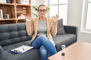 A person self-soothing with mindfulness to reduce rumination and obsessing 