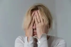 person struggling with cognitive dissonance from narcissistic abuse